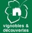 Logo verde «Vigneti e Scoperte» con foglia di vite e sagoma di castello, certificazione enoturistica per Château Papounan a Saint-Estèphe, Médoc.